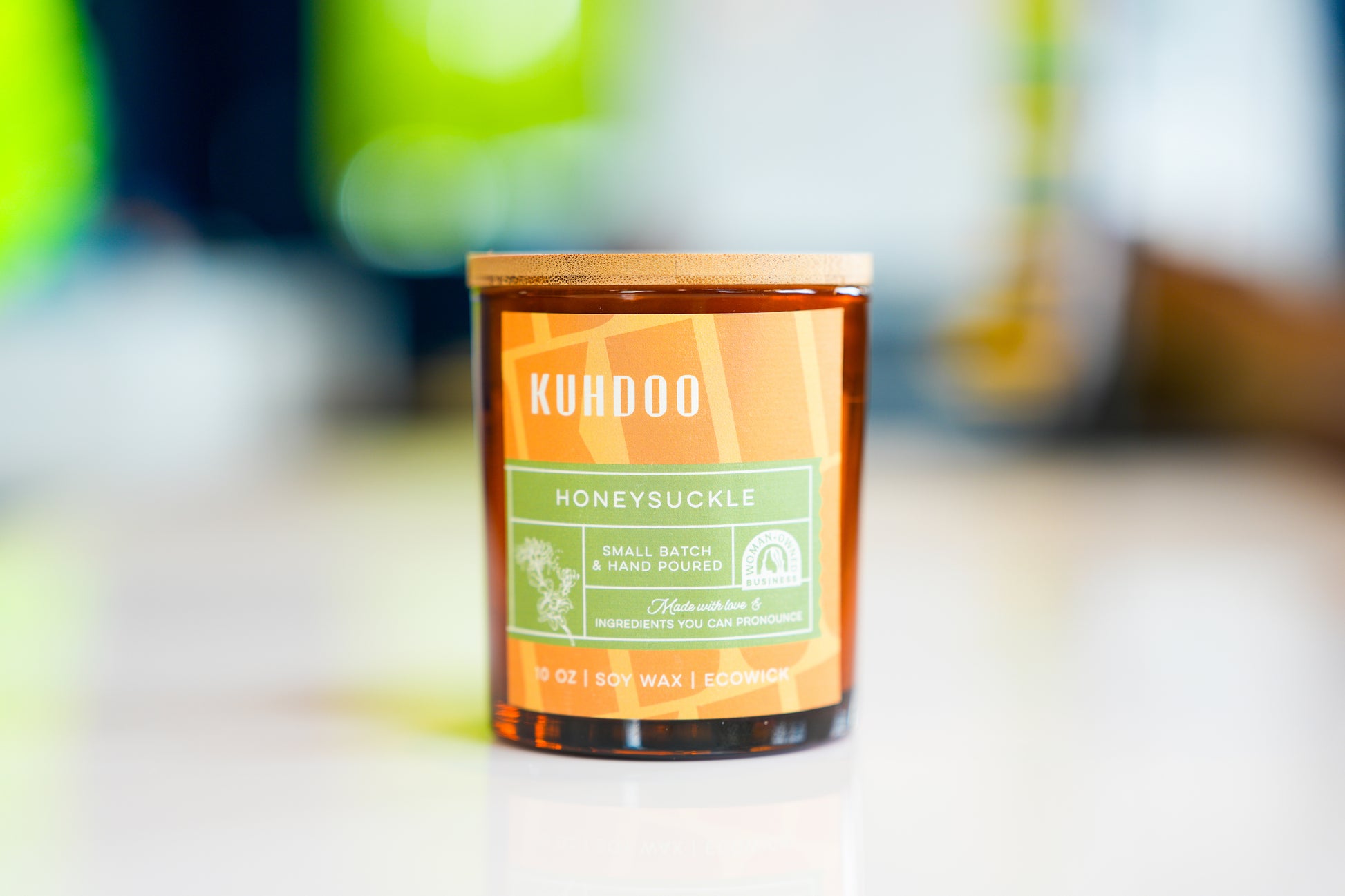 Honeysuckle Candle hand poured in a glass container by Kuhdoo