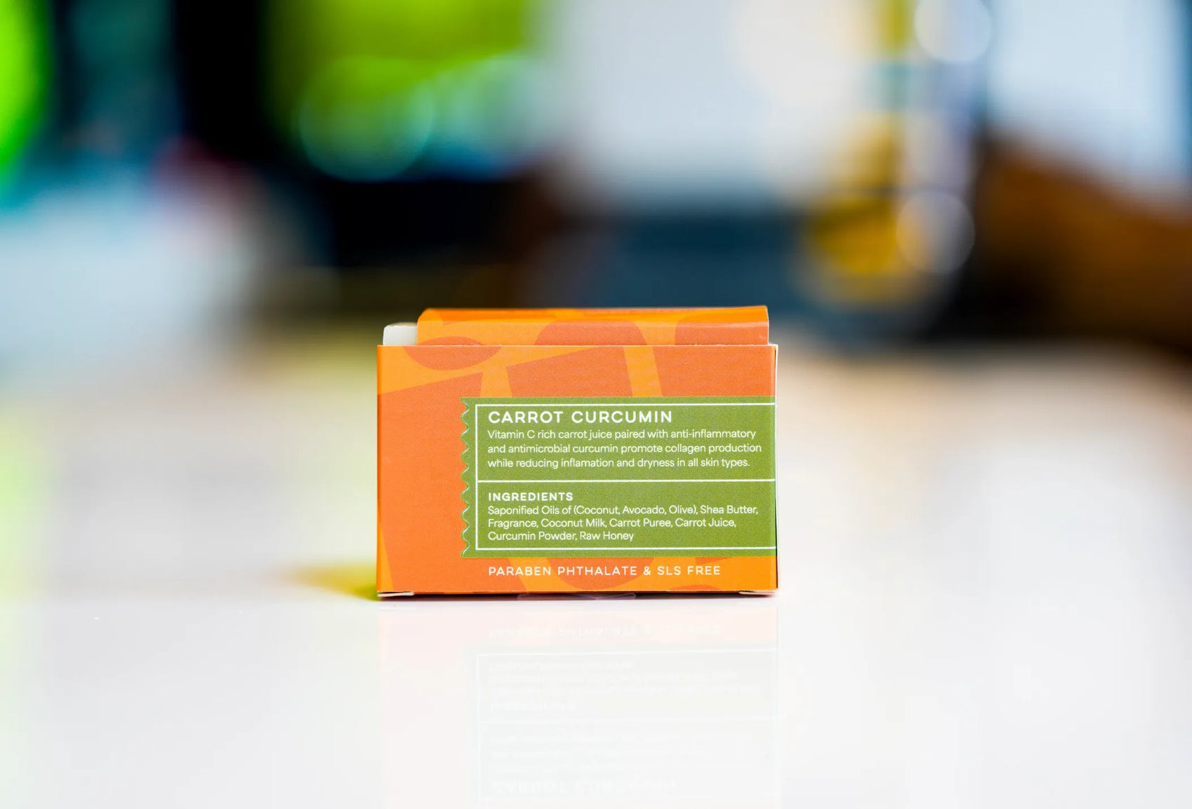 Carrot curcumin soap back label with antioxidant-rich formula, showing ingredients and eco-friendly label