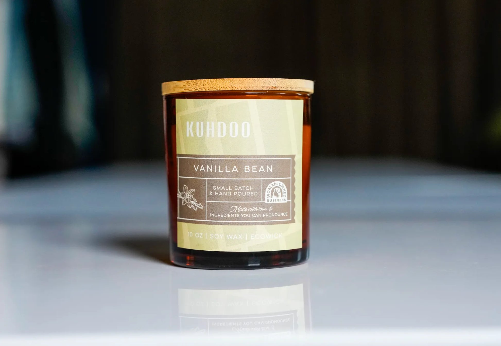 Vanilla Bean Candle hand poured in a glass container by Kuhdoo